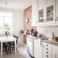 light white kitchen interior with a touch of sandy photo