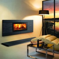 hinged electric fireplace in the apartment photo
