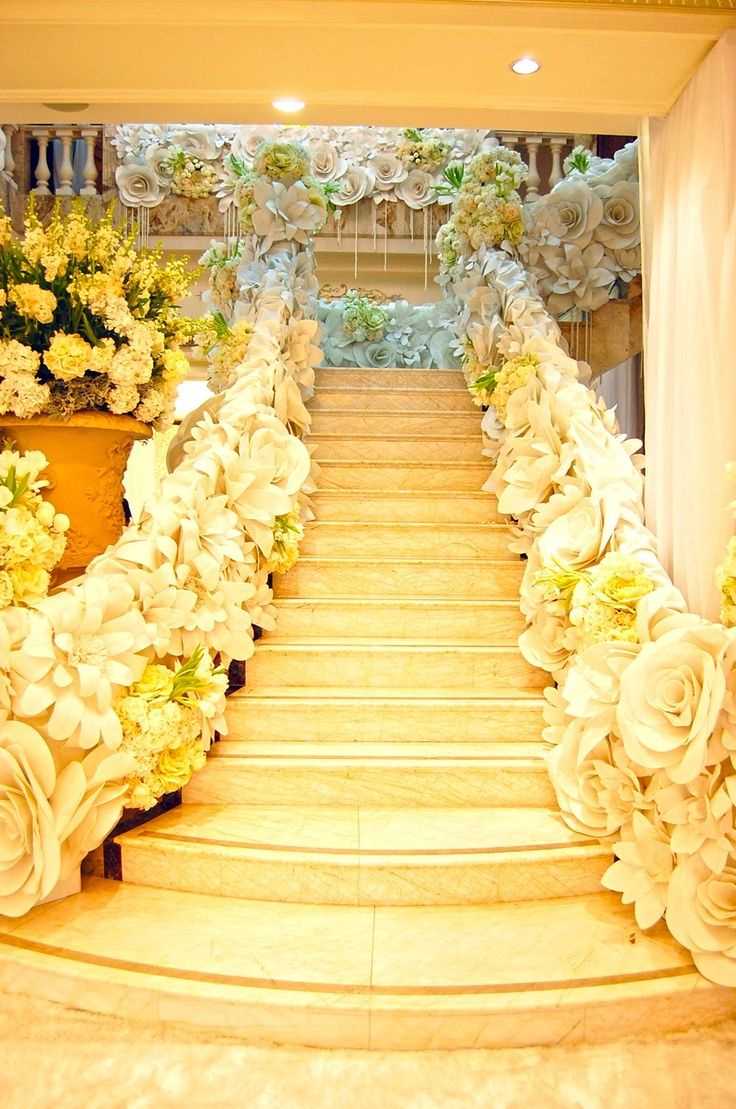 yellow paper flowers in the decoration of the festive hall