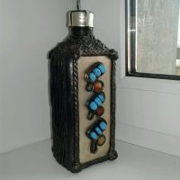 L'idée d'une belle décoration de bouteilles en verre de cuir avec vos propres mains