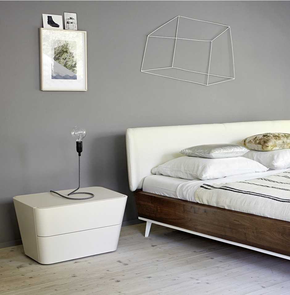 a combination of light gray in the decor of the bedroom