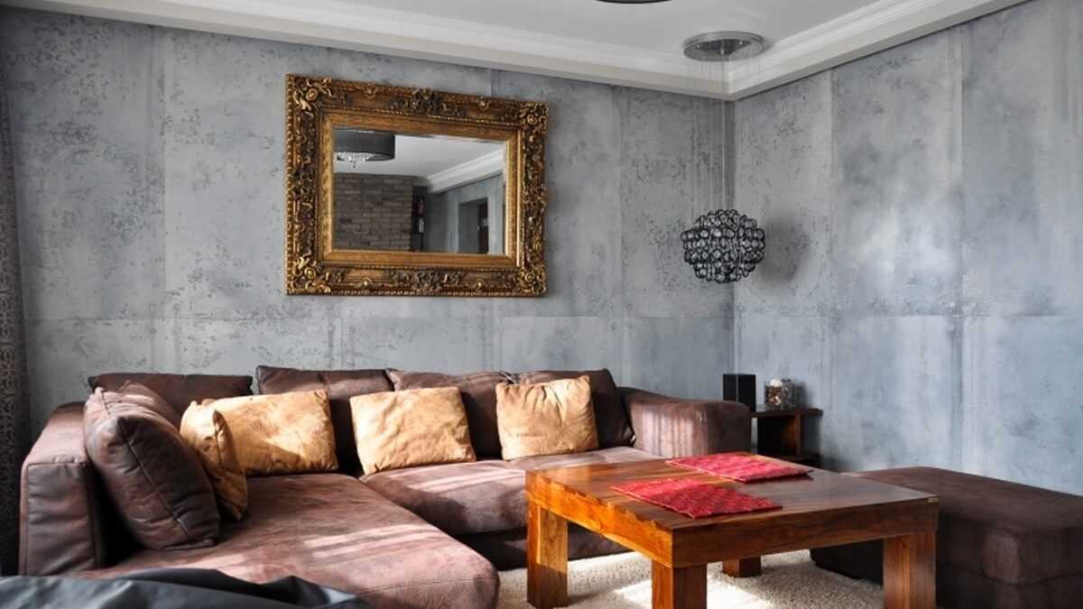 versione dell'intonaco decorativo originale nel design del soggiorno per calcestruzzo