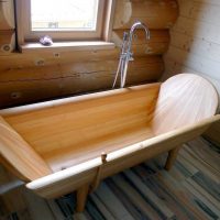 idée du style insolite d'une salle de bain dans une maison en bois photo