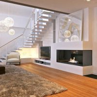 l'idea di un moderno appartamento interno con una seconda foto di luce