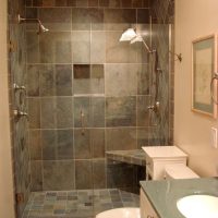 version of the unusual design of the bathroom in beige color photo