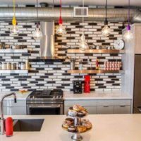 kitchen loft with black and white tiles