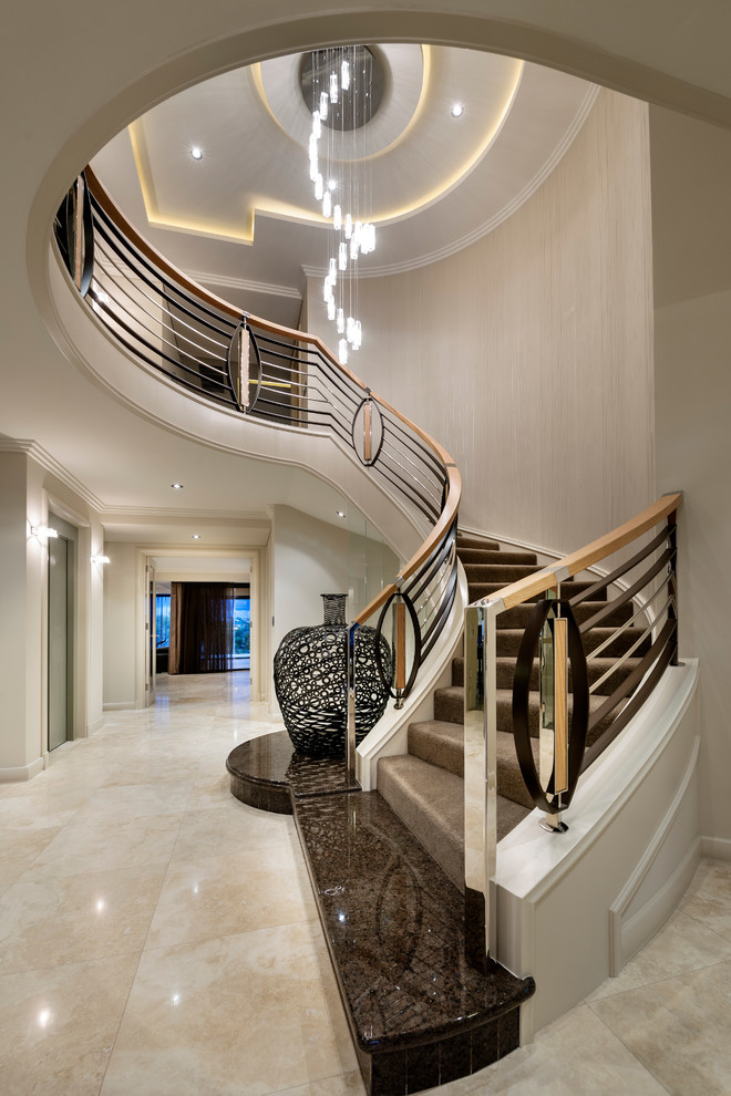 curved staircase to the second floor