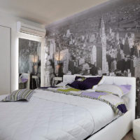 foto van een slaapkamer met grijs behang