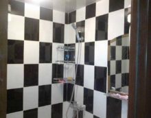 option of a light interior laying tiles in the bathroom photo