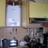 example of a light kitchen design with a gas water heater photo