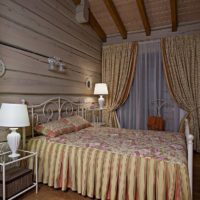 chambre à coucher dans un intérieur design de maison en bois