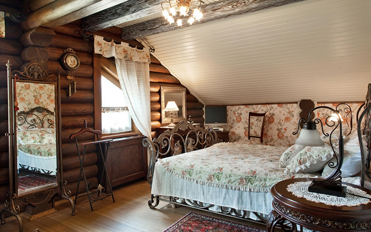 camera da letto in una casa di campagna in legno