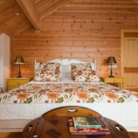 camera da letto in una casa di legno