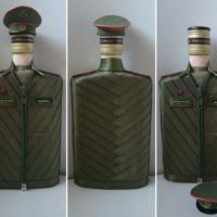 Glass bottle in a military tunic