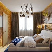 Golden shades in the interior of the bedroom 12 square meters