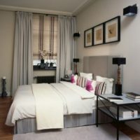 Pictures and lamps in the interior of the bedroom 12 sq. Meters