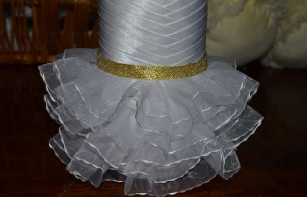 DIY bow skirt on a bottle of champagne