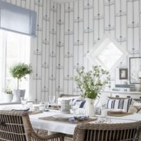Vinyl wallpaper in the design of the walls of the kitchen