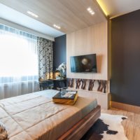 Wooden panels in the design of the bedroom