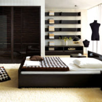 Straight lines in the bedroom interior with dark furniture