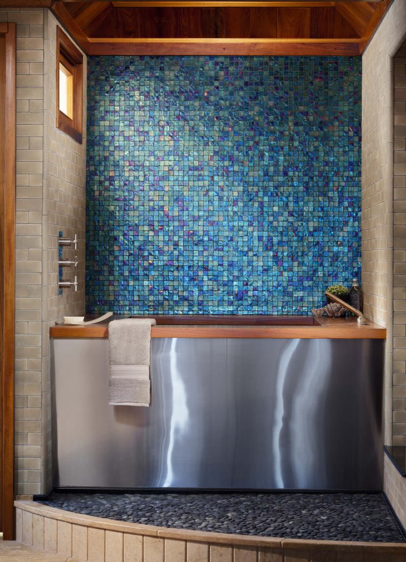 Mosaic decoration of walls and floors in the bathroom