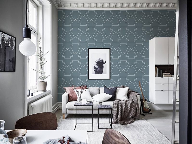 Living room interior with geometric wallpaper on the wall