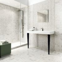 Gray and white mosaic in the design of the bathroom