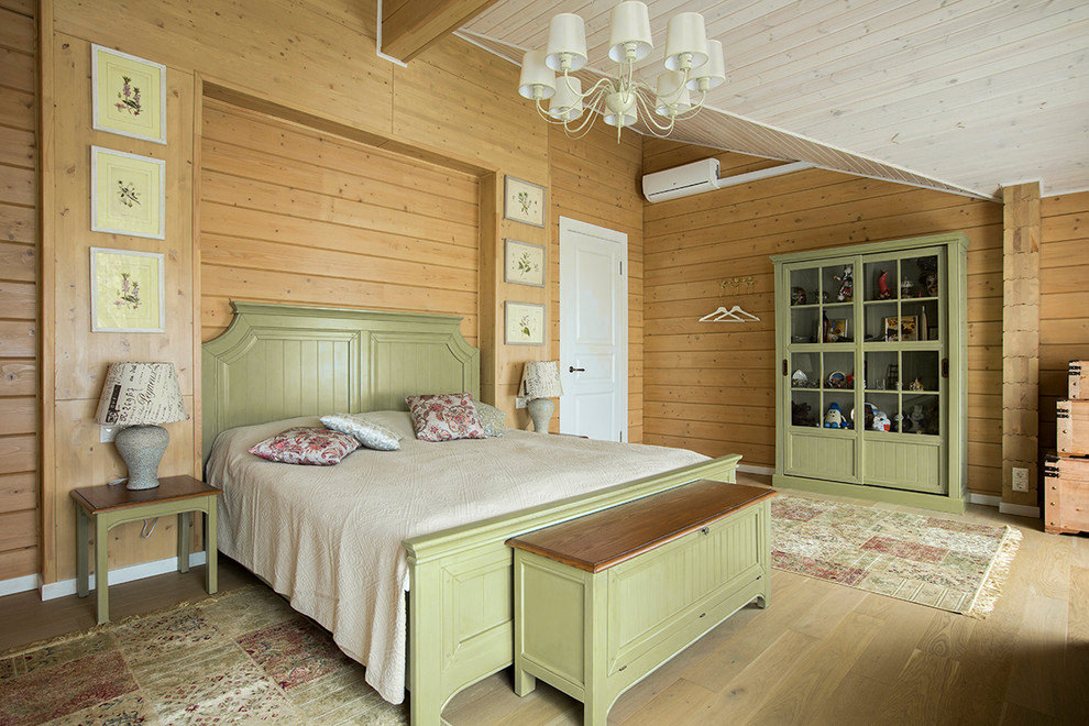 Camera da letto di design con mobili in ulivo e pareti in legno
