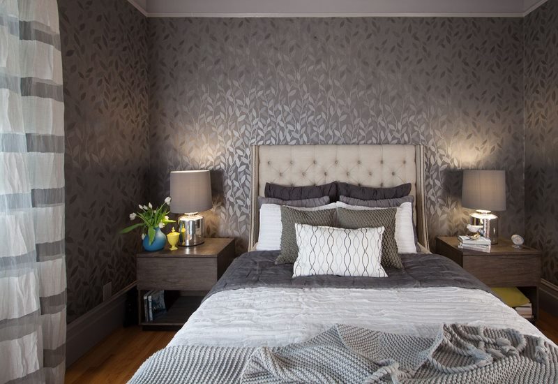 Dark gray wallpaper in the bedroom of a country house