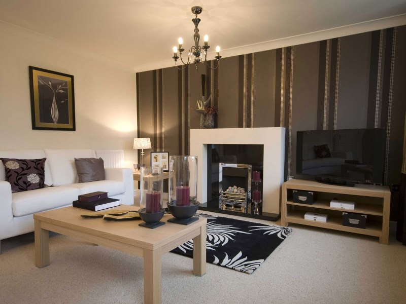 The combination of brown and beige in the interior of the living room