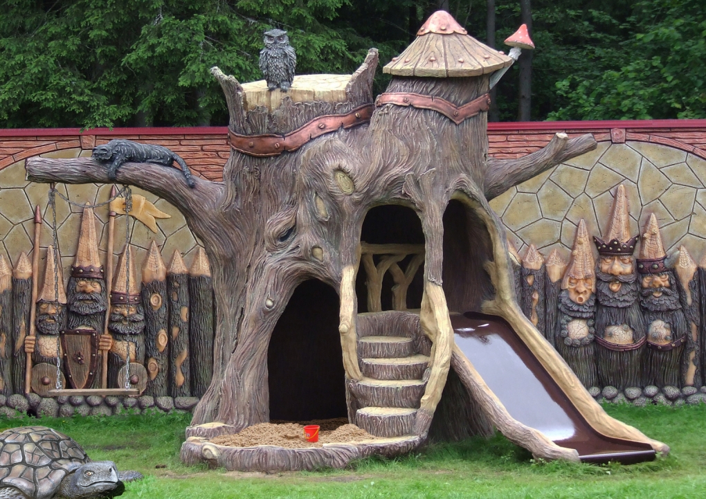Children's slide in the style of Ancient Russia as a small architectural form in the garden
