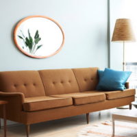 Design project of a living room with a brown sofa