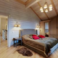 La disposizione della camera da letto in soffitta