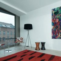 Black floor lamp in a room with panoramic windows