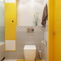 Dzelteni akcenti modernā tualetē