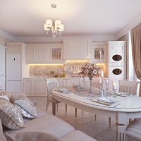 Elegante cucina-soggiorno in tonalità crema