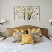 Decorative pillows on a white bed