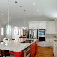 Large kitchen island with marble countertops