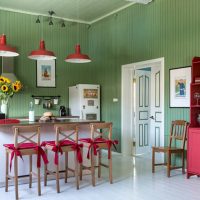 Green walls in a provence style kitchen