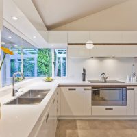 High-tech kitchen with white facades