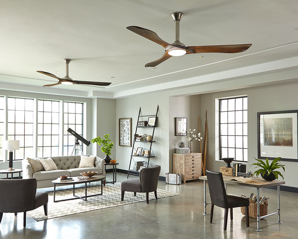 Two chandeliers with fans on the ceiling of the living room