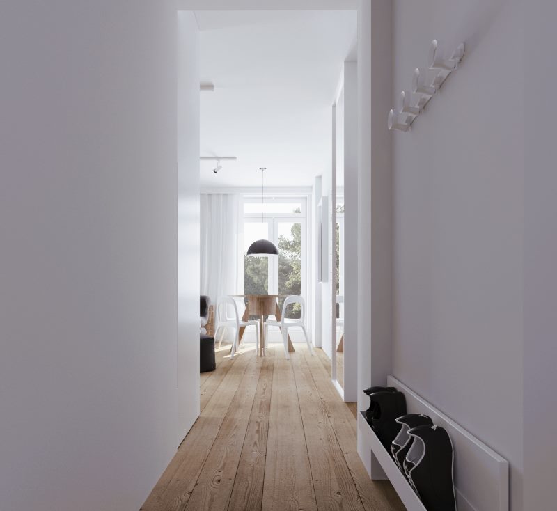 Murs blancs d'un couloir étroit dans un style minimaliste.