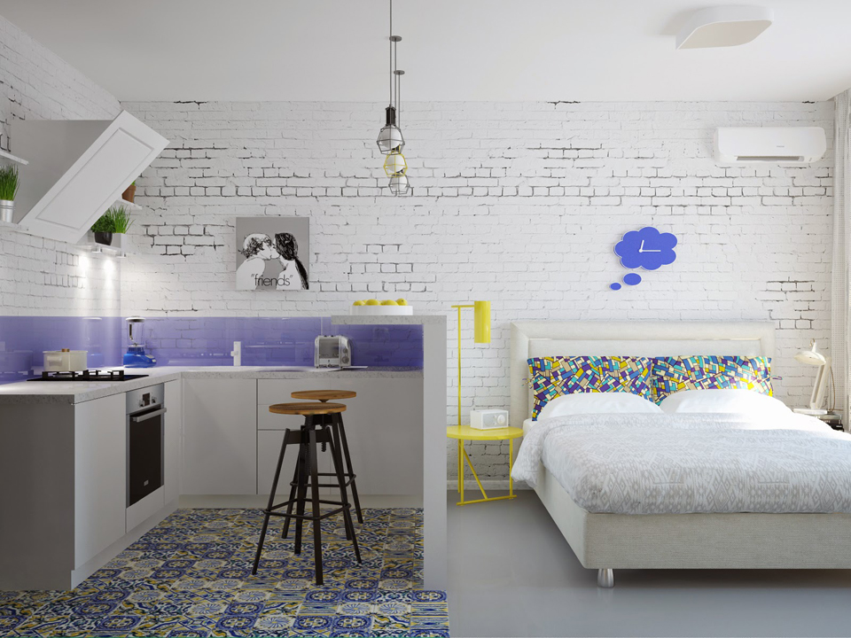 Muro di mattoni bianchi in un piccolo appartamento in stile loft