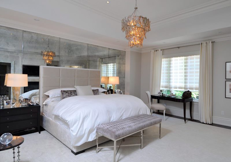 Wall decoration in the bedroom with large format mirror tiles