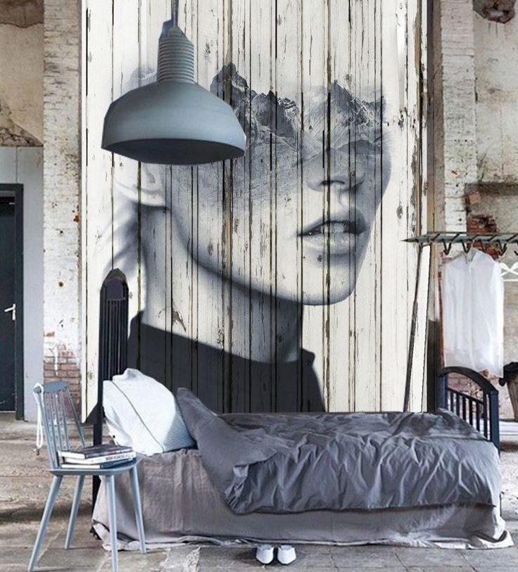 Image d'une fille sur un lit dans une chambre de style loft