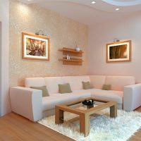 Smėlio spalvos tapetai gyvenamajame kambaryje su kampine sofa
