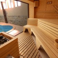 Interior of a modern sauna with a swimming pool