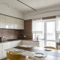 Decorating the walls of the kitchen with wooden slats