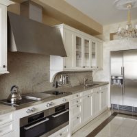 Stainless steel household appliances in the interior of the kitchen