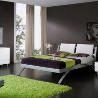 Green accents in the gray bedroom
